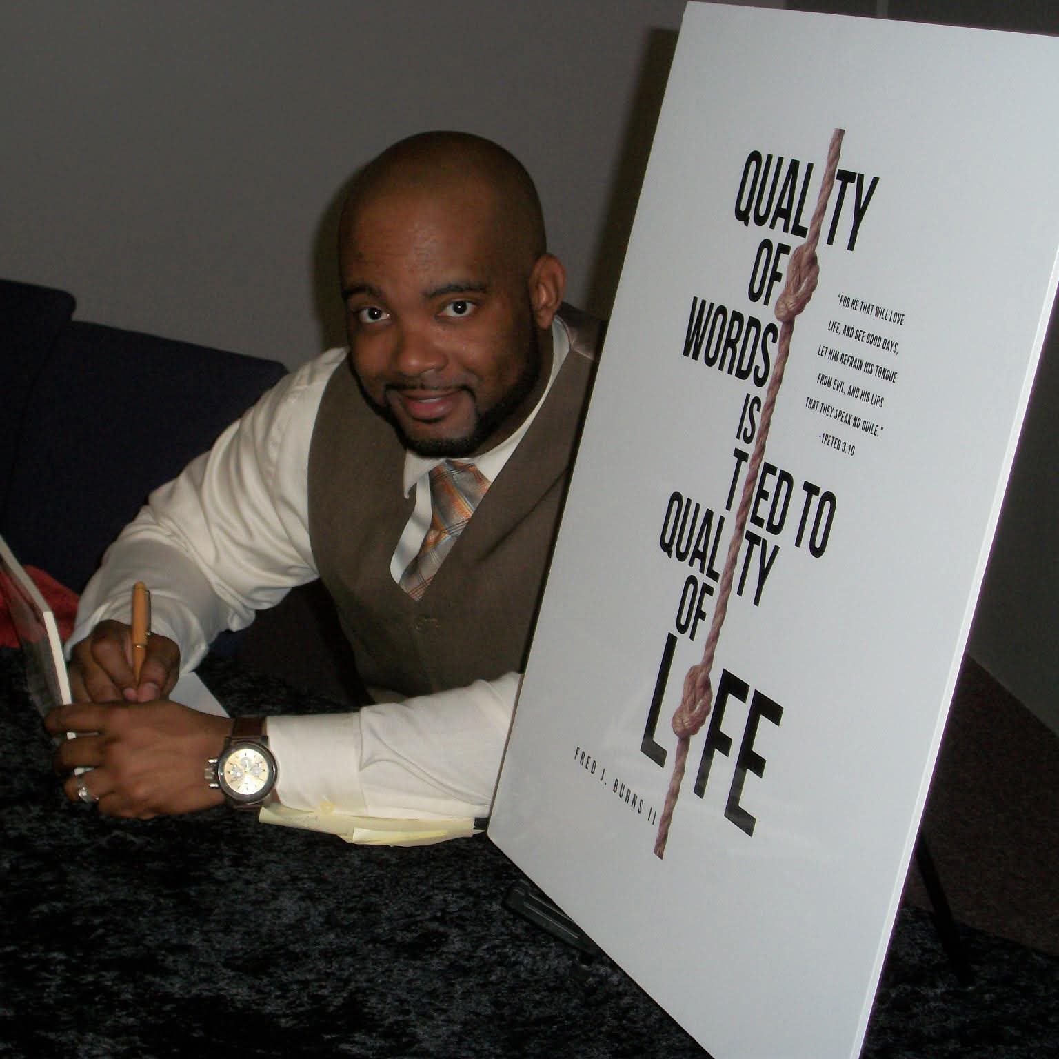 Fred B signing his book